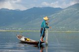 Inle Lake at 116 sq km (44.9 sq miles) is shallow, long, crystal clear and calm. Here the Intha people live, hemmed in on both sides by tall hills. The Intha men are famous for rowing standing up, using one leg, whilst fishing with tall, conical traps for Inle carp and the other, smaller fish with which the lake swarms.<br/><br/>

The Intha women, champion market gardeners, use the fertile soil around the lake, as well as floating islands made of water hyacinths and mud, to grow cauliflower, tomatoes, cucumbers, cabbages, beans and aubergines. Inle is a simple place, but a place of plenty - both restful and sublime.